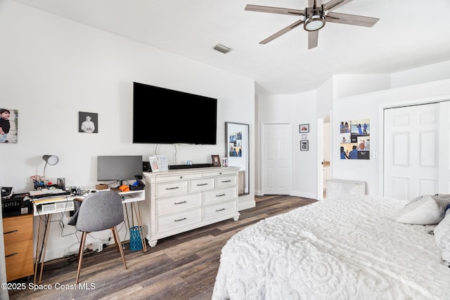 405 Lake View Ln, Grant-Valkaria, FL 32909 - bedroom featuring dark wood-style flooring, a desk, and a ceiling fan