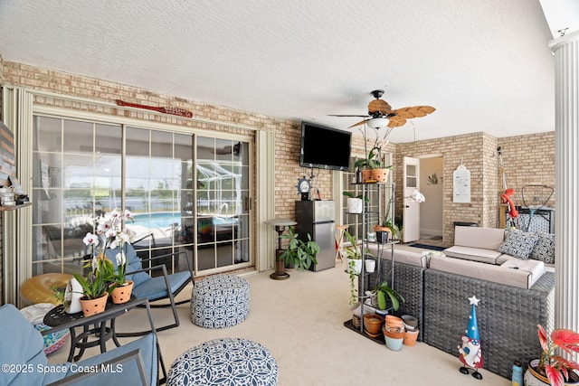 405 Lake View Ln, Grant-Valkaria, FL 32909 - view of patio / terrace with ceiling fan and an outdoor living space