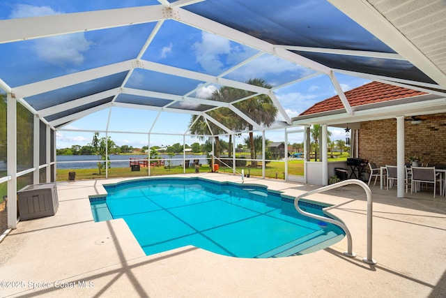 405 Lake View Ln, Grant-Valkaria, FL 32909 - swimming pool with a patio, outdoor dining area, and a lanai