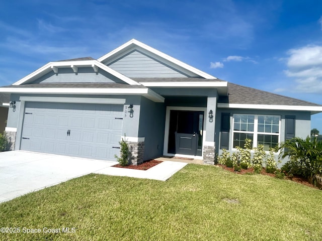 1225 Kylar Dr NE, Palm Bay, FL 32907 - view of front of property with a garage, a front lawn, concrete driveway, stone siding, and stucco siding