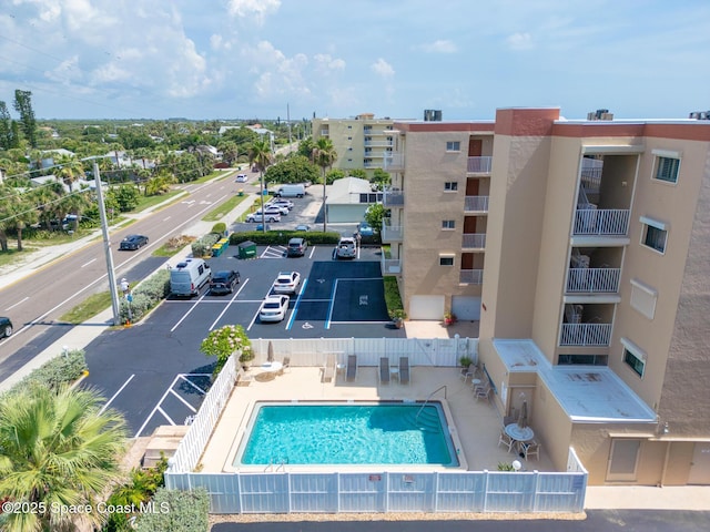 1525 S Atlantic Ave Unit 401, Cocoa Beach, FL 32931 - aerial view of a pool area and apartment complex