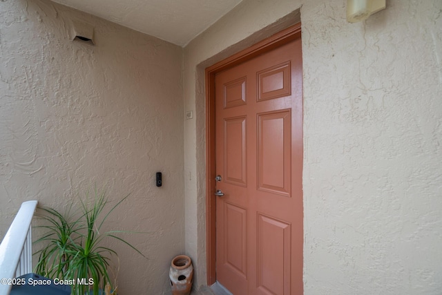 1525 S Atlantic Ave Unit 401, Cocoa Beach, FL 32931 - entrance to property featuring stucco siding