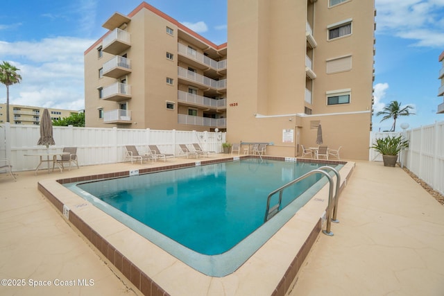 1525 S Atlantic Ave Unit 401, Cocoa Beach, FL 32931 - community pool with a patio area
