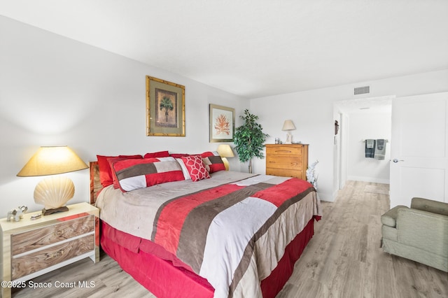 1525 S Atlantic Ave Unit 401, Cocoa Beach, FL 32931 - bedroom featuring wood finished floors