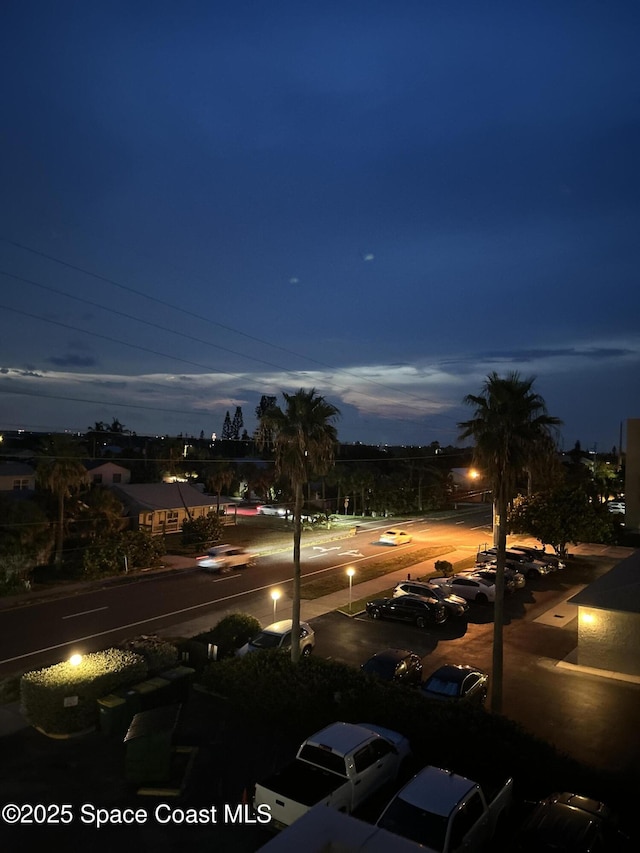 1525 S Atlantic Ave Unit 401, Cocoa Beach, FL 32931 - view of uncovered parking lot