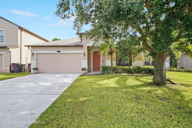 500 Loxley Ct, Titusville, FL 32780 - view of front of home with stucco siding, a garage, a front lawn, and concrete driveway