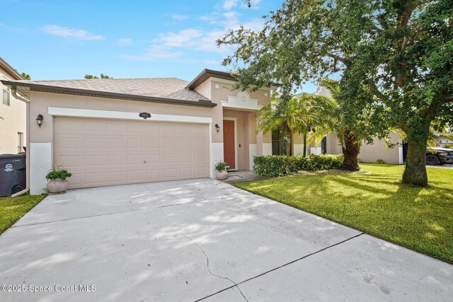 500 Loxley Ct, Titusville, FL 32780 - view of front of property with stucco siding, driveway, a front yard, and an attached garage