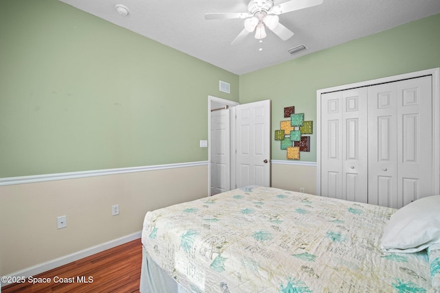 500 Loxley Ct, Titusville, FL 32780 - bedroom with dark wood-style floors, a closet, and ceiling fan