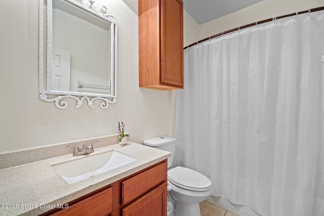 500 Loxley Ct, Titusville, FL 32780 - full bathroom with vanity, tile patterned flooring, and a shower with shower curtain