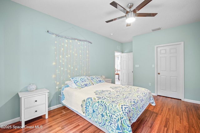 500 Loxley Ct, Titusville, FL 32780 - bedroom with wood finished floors and ceiling fan