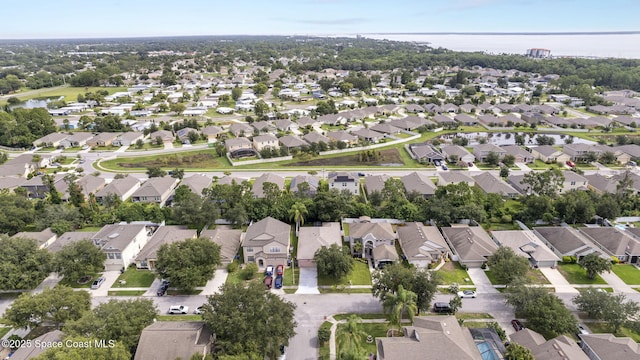 500 Loxley Ct, Titusville, FL 32780 - aerial view of property and surrounding area with nearby suburban area