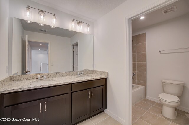 3265 Viridian Cir, West Melbourne, FL 32904 - bathroom with double vanity, tile patterned floors, and  shower combination