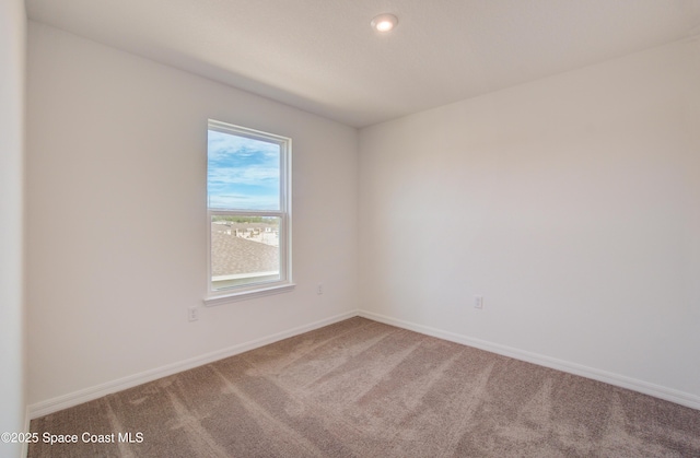 3265 Viridian Cir, West Melbourne, FL 32904 - carpeted spare room with baseboards