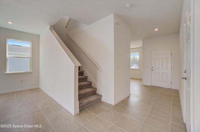 3265 Viridian Cir, West Melbourne, FL 32904 - staircase with tile patterned floors and recessed lighting