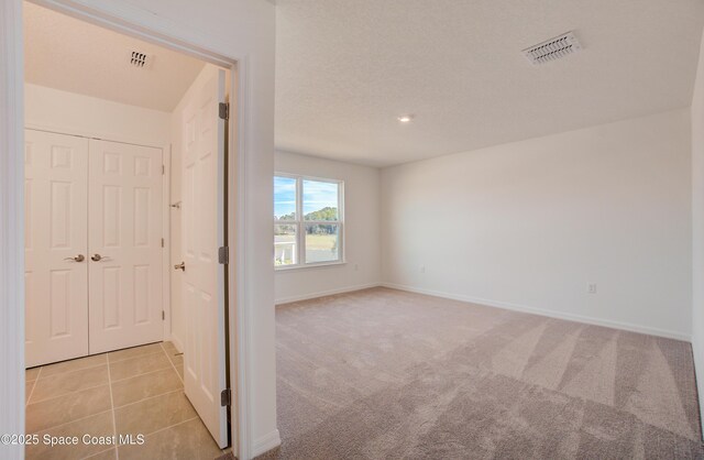 3265 Viridian Cir, West Melbourne, FL 32904 - unfurnished room featuring baseboards and light carpet