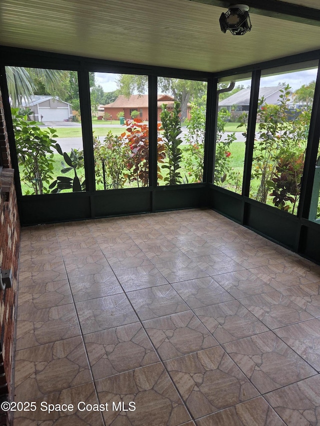 744 John Carroll Ln, Melbourne, FL 32904 - unfurnished sunroom with plenty of natural light