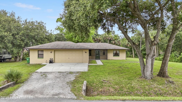 3375 Bryce St, Cocoa, FL 32926 - ranch-style home with concrete driveway, stucco siding, an attached garage, and a front yard