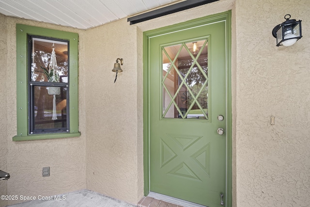 3375 Bryce St, Cocoa, FL 32926 - view of exterior entry with stucco siding