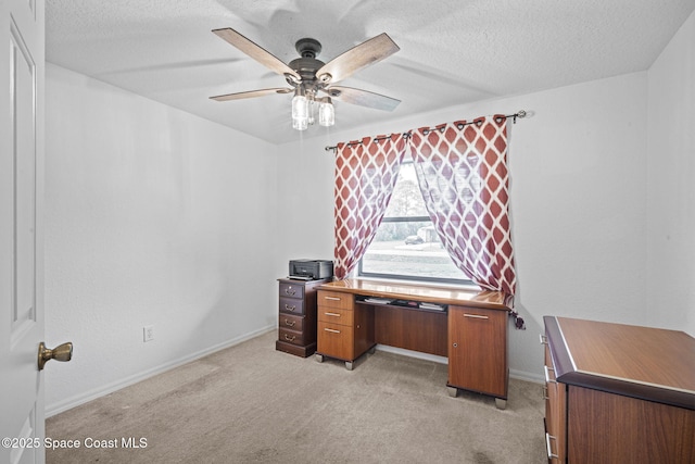 3375 Bryce St, Cocoa, FL 32926 - unfurnished office with ceiling fan, light carpet, and a textured ceiling