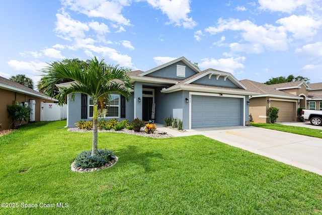 711 Tupelo Cir, Cocoa, FL 32926 - view of front facade featuring stucco siding, a garage, and driveway