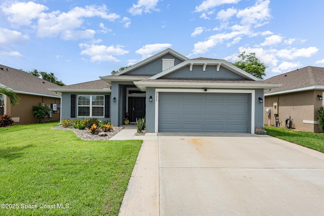 711 Tupelo Cir, Cocoa, FL 32926 - view of front of house with stucco siding, driveway, an attached garage, and a front lawn