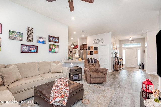 711 Tupelo Cir, Cocoa, FL 32926 - living room featuring a ceiling fan, light wood-style flooring, and recessed lighting