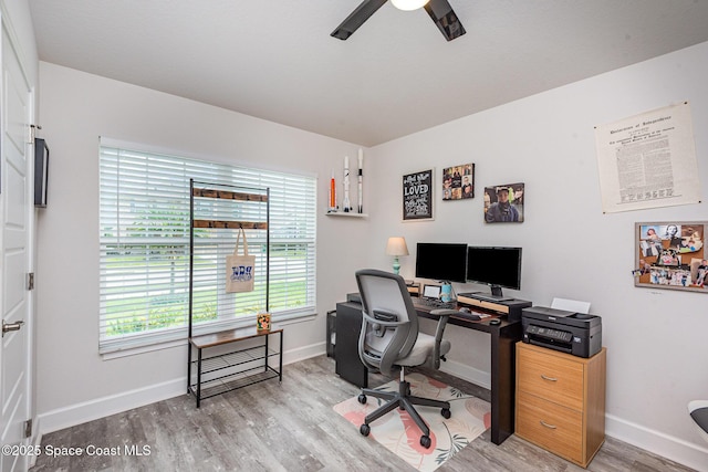 711 Tupelo Cir, Cocoa, FL 32926 - office area with wood finished floors and ceiling fan