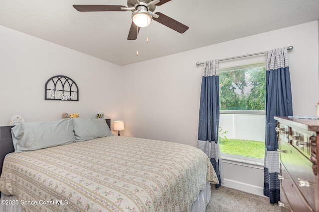 711 Tupelo Cir, Cocoa, FL 32926 - bedroom featuring light colored carpet and a ceiling fan
