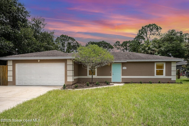 6355 Betty Ave, Cocoa, FL 32927 - ranch-style home with stucco siding, concrete driveway, a garage, and roof with shingles