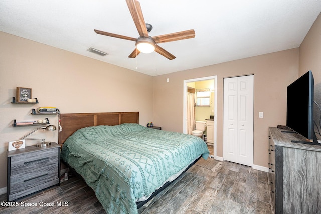6355 Betty Ave, Cocoa, FL 32927 - bedroom featuring dark wood-style floors, ceiling fan, connected bathroom, and a closet