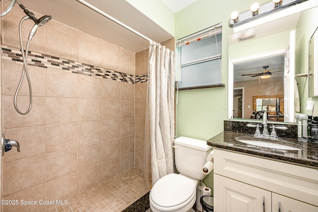 6355 Betty Ave, Cocoa, FL 32927 - full bath with vanity, tiled shower, and a ceiling fan
