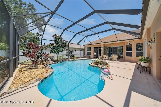 3616 Peninsula Cir, Melbourne, FL 32940 - outdoor pool featuring a patio area and a ceiling fan
