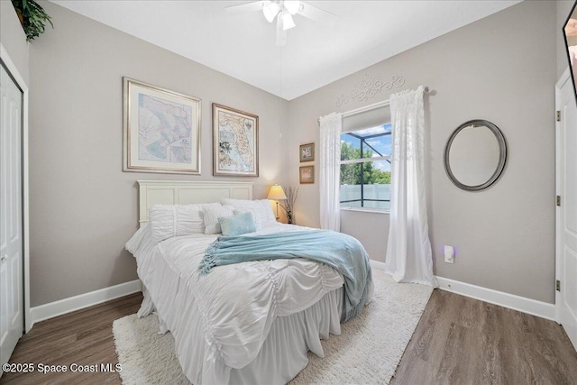 3616 Peninsula Cir, Melbourne, FL 32940 - bedroom with wood finished floors and a ceiling fan
