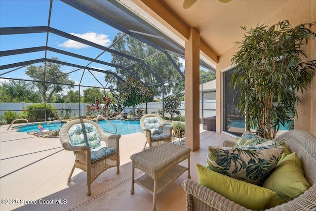 3616 Peninsula Cir, Melbourne, FL 32940 - fenced backyard featuring an outdoor hangout area, a patio, and a ceiling fan