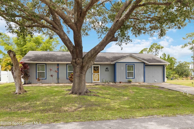 542 Troy Rd SW, Palm Bay, FL 32908 - ranch-style house with a garage, driveway, and roof with shingles