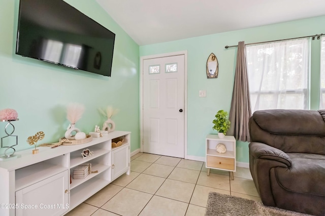 542 Troy Rd SW, Palm Bay, FL 32908 - foyer featuring light tile patterned floors and baseboards