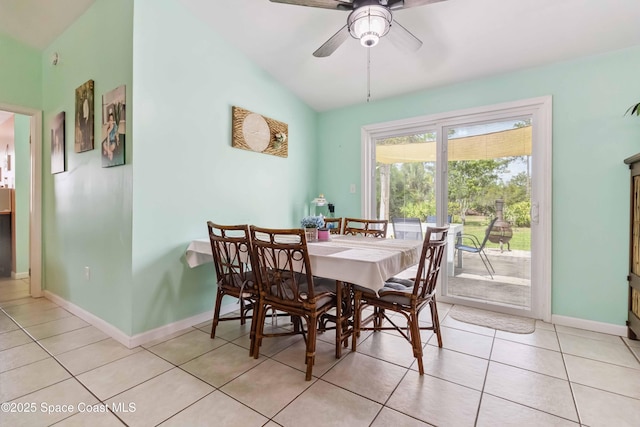 542 Troy Rd SW, Palm Bay, FL 32908 - dining area with vaulted ceiling, ceiling fan, and light tile patterned floors