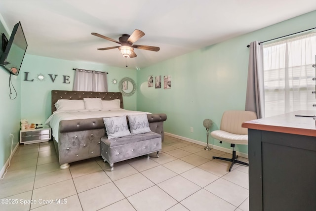 542 Troy Rd SW, Palm Bay, FL 32908 - bedroom with light tile patterned floors and a ceiling fan