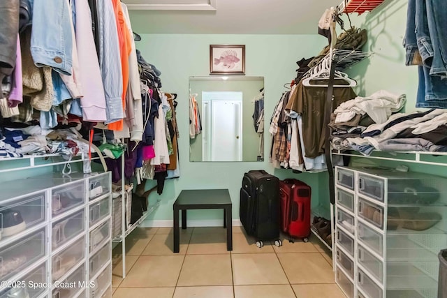 542 Troy Rd SW, Palm Bay, FL 32908 - walk in closet featuring tile patterned floors