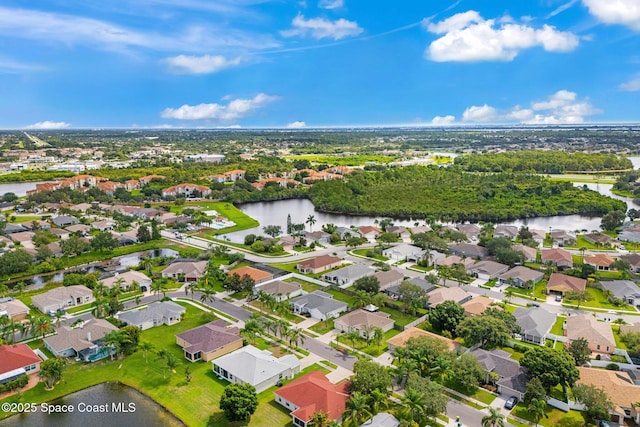 1493 Laramie Cir, Melbourne, FL 32940 - aerial perspective of suburban area with a large body of water