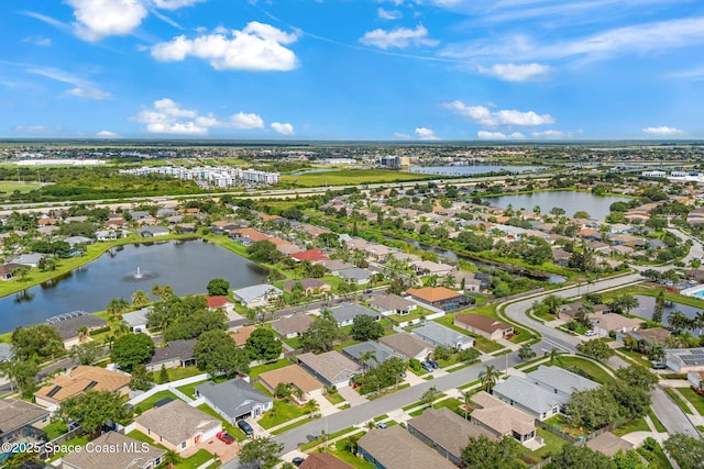 1493 Laramie Cir, Melbourne, FL 32940 - aerial view of property and surrounding area with nearby suburban area and a large body of water