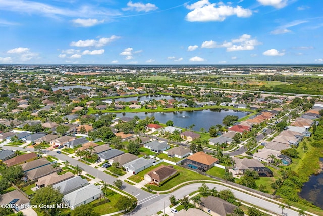 1493 Laramie Cir, Melbourne, FL 32940 - aerial view of property and surrounding area featuring a nearby body of water and nearby suburban area