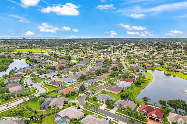 1493 Laramie Cir, Melbourne, FL 32940 - aerial view of residential area with a large body of water