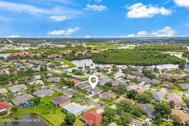 1493 Laramie Cir, Melbourne, FL 32940 - aerial perspective of suburban area featuring a large body of water