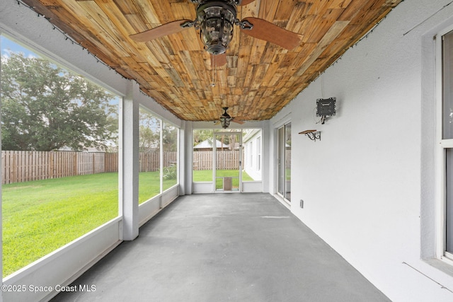 1493 Laramie Cir, Melbourne, FL 32940 - unfurnished sunroom featuring a ceiling fan and healthy amount of natural light