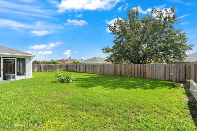 1493 Laramie Cir, Melbourne, FL 32940 - fenced backyard featuring a sunroom