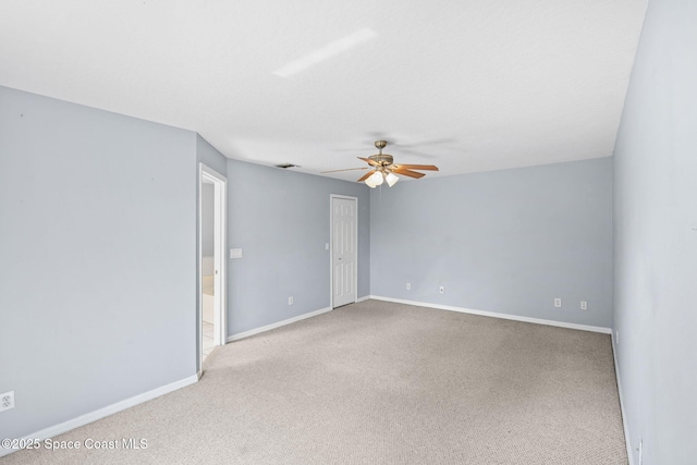 1493 Laramie Cir, Melbourne, FL 32940 - unfurnished room with a ceiling fan and carpet floors