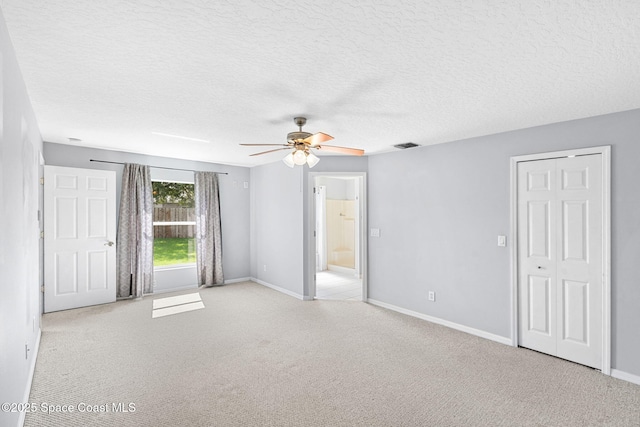 1493 Laramie Cir, Melbourne, FL 32940 - carpeted spare room with a ceiling fan and a textured ceiling