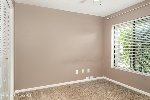 386 Myrtlewood Rd, Melbourne, FL 32940 - unfurnished room with carpet floors and a ceiling fan