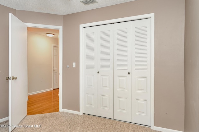 386 Myrtlewood Rd, Melbourne, FL 32940 - unfurnished bedroom with a closet and light carpet